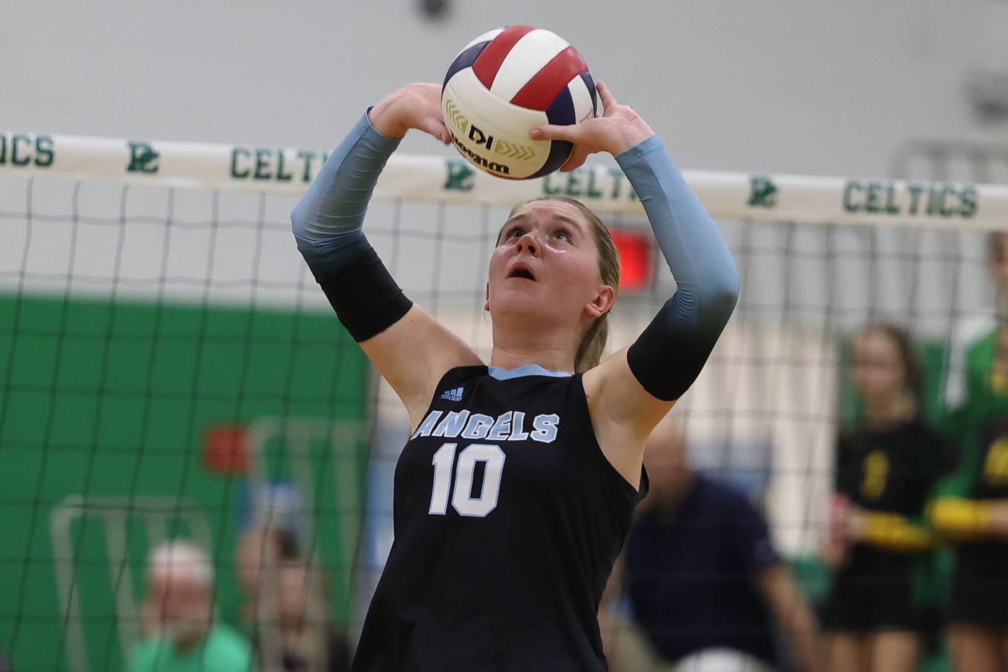 Joliet Catholic's Olivia Emerson sets the ball against Providence on Thursday, Sept. 19, 2024 in New Lenox.