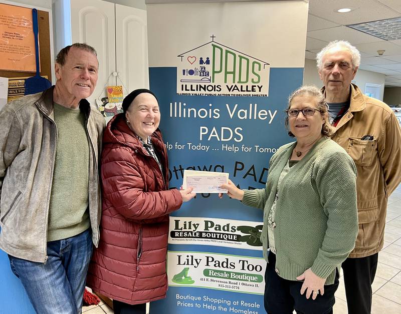 Illinois Valley Public Action to Deliver Shelter Board Member Tom Rooney, donor Karen Nussbaum, IV PADS Executive Director Carol Alcorn and donor Nelson Nussbaum pose for a photo after the Nussbaums donated $50,000 to a new Ottawa shelter.
