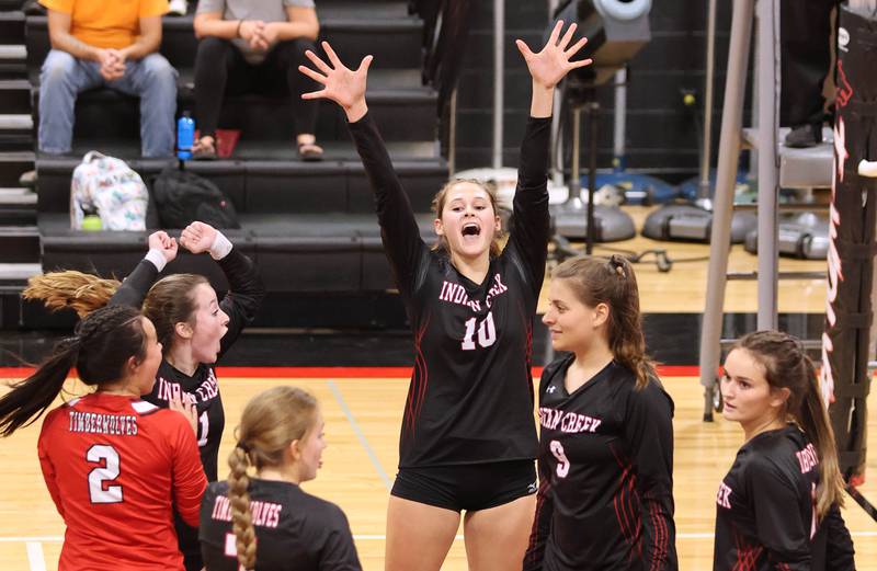 Indian Creek celebrates a point during their match against DeKalb Tuesday, Sept. 6, 2022, at Indian Creek High School in Shabbona.