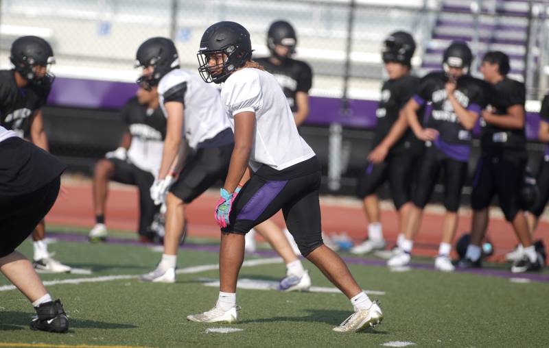 Downers Grove North’s Noah Battle lines up for a play during a practice at the school on Tuesday, Aug. 15, 2023.