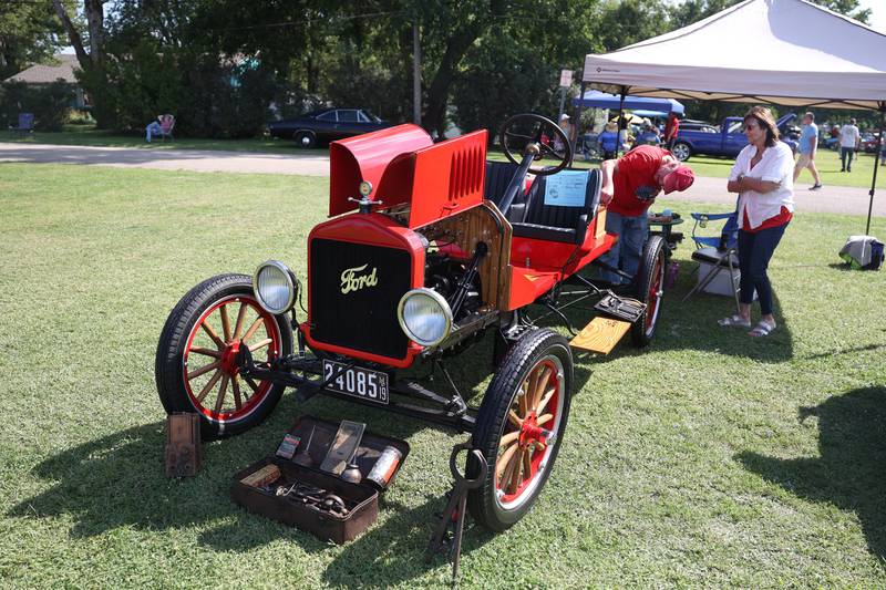 Norm Rusher and Rosemary Staszko check out the 1918 Ford Model T Speedster at the Crest Hill Lions Luau and Car Show on Sunday, Sept. 1, 2024 in Crest Hill.