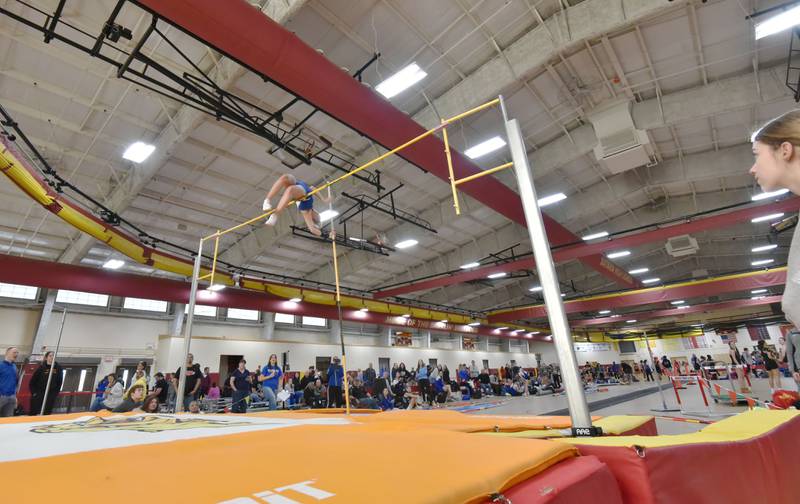 Wheaton North’s Emme Smith attempts 11 feet in the pole vault at the Dukane Conference girls indoor track and field meet in the fieldhouse at Batavia High School on Friday, March 15, 2024. She placed second in the event.