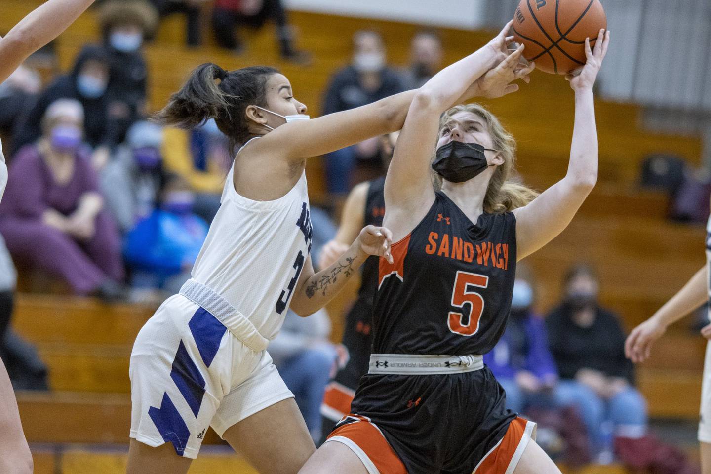 Sandwich's Alexis Sexton (5) works against Plano's Ryssa Woodhouse last January in Plano.