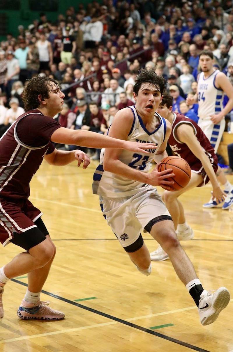 Princeton sophomore Noah LaPorte drives hard to the lane in Friday's Class 2A Orion Sectional at Geneseo against Rockridge.