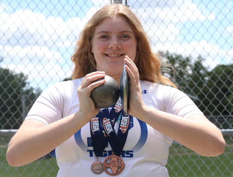 Princeton's Morgan Foes poses for a photon the throwing area on Wednesday, May 29, 2024 at Princeton High School. Foes is the NewsTribune girls track athlete of the year.