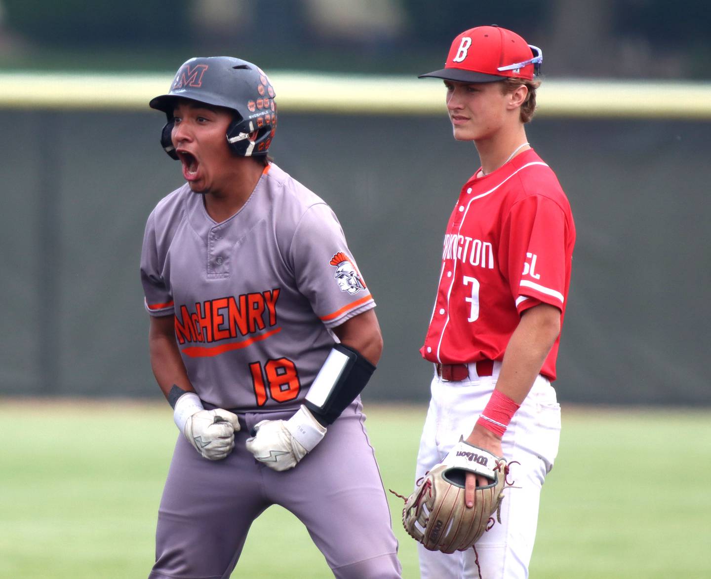 McHenry’s AJ Chavera celebrates a safe arrival at second  base on a double against Barrington’s in IHSA Class 4A Sectional Title Game baseball action at McHenry High School in McHenry on Saturday, June 7, 2025.