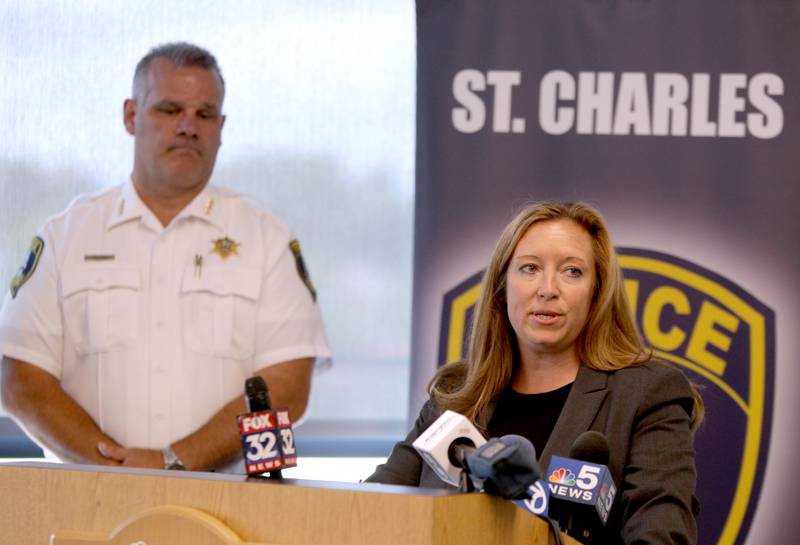 Kane County State's Attorney Jamie Mosser, with St. Charles Police Chief James Keegan, announces the filing of charges for human trafficking-related offenses against multiple individuals during a press conference at the St. Charles Police Department on Thursday, June 20, 2023.
