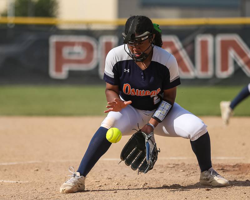 Oswego's Jaelynn Anthony (20) fields a come backer during Class 4A Plainfield North Sectional final softball game between Wheaton North at Oswego. May 31th, 2024.