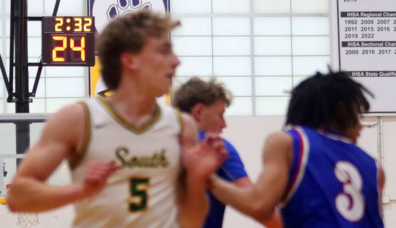 The shot clock ticks away as Crystal Lake South faces Lakes in varsity boys basketball Hinkle Holiday Classic action on Friday, Dec. 26, 2025, at Jacobs High School in Algonquin.
