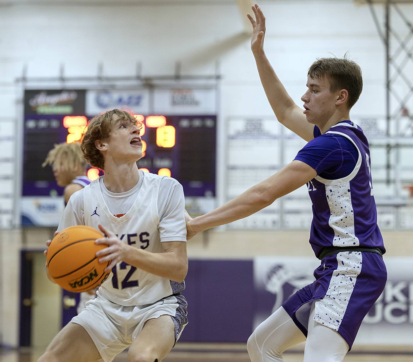 Dixon’s Gabe Rowley looks to put up a shot against Rochelle Monday, Dec. 9, 2024, at Dixon High School.