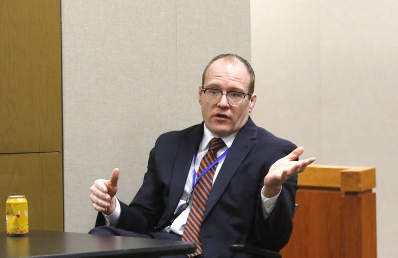 McHenry County State's Attorney Patrick Keneally  answers a question from Lake County Judge George Strickland during the fifth day of the trial for the former Illinois Department of Children and Family Services employees Carlos Acosta and Andrew Polovin before Lake County Judge George Strickland on Friday, Sept. 15, 2023, at the McHenry County Courthouse. Acosta, 57, of Woodstock, and Polovin, 51, of Island Lake, each are charged with two counts of endangering the life of a child and health of a minor, Class 3 felonies, and one count of reckless conduct, a Class 4 felony, related to their handling of the AJ Freund case.