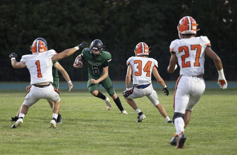 Rock Falls’ Phillip Griffith Jr. looks to run against Byron Thursday, August 28, 2025.