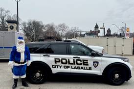 La Salle Officer Santa delivers gifts to 100 children