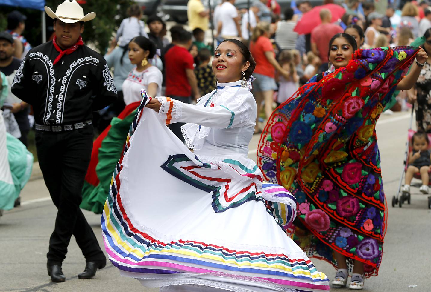Dancers perform Sunday, July 2, 2023 during Crystal Lake’s annual Independence Day Parade on Dole Avenue in Crystal Lake. This year’s parade feature close to 100 units.