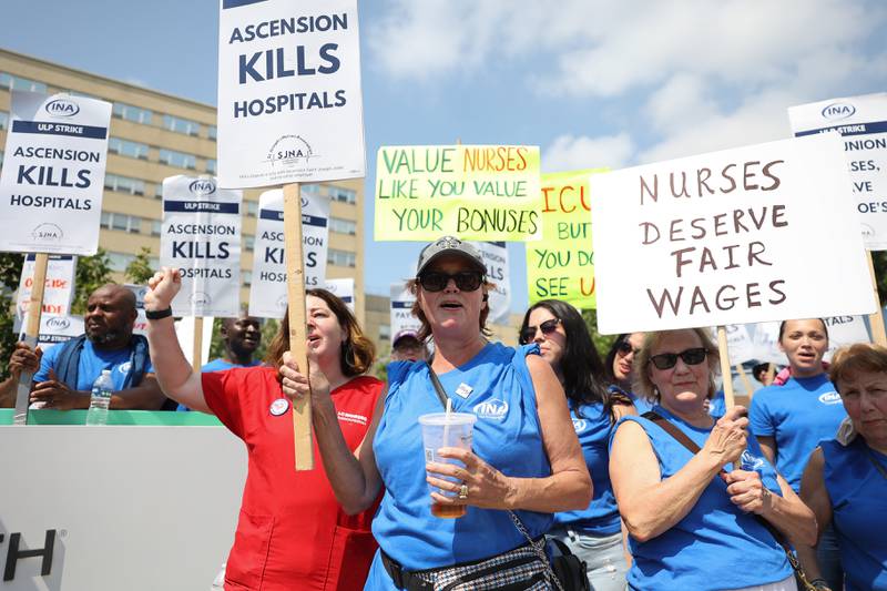 Nurses and supporters gather to picket outside Ascension Saint Joseph-Joliet hospital on the first day of a two day strike, followed by a two day lockout on Tuesday, Aug. 22, 2023.