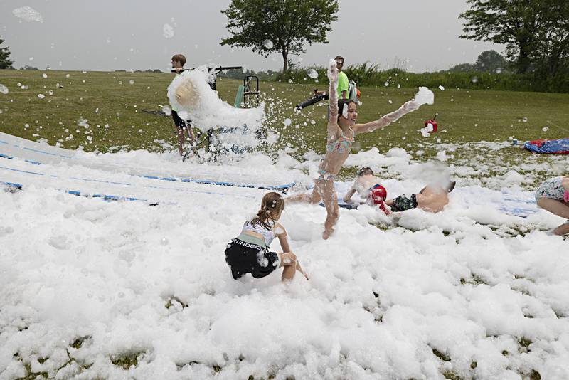 Dixon Park District SPARK campers were treated Thursday, June 15, 2023 to a foam machine on the grounds of The Facility as part of the day camp.