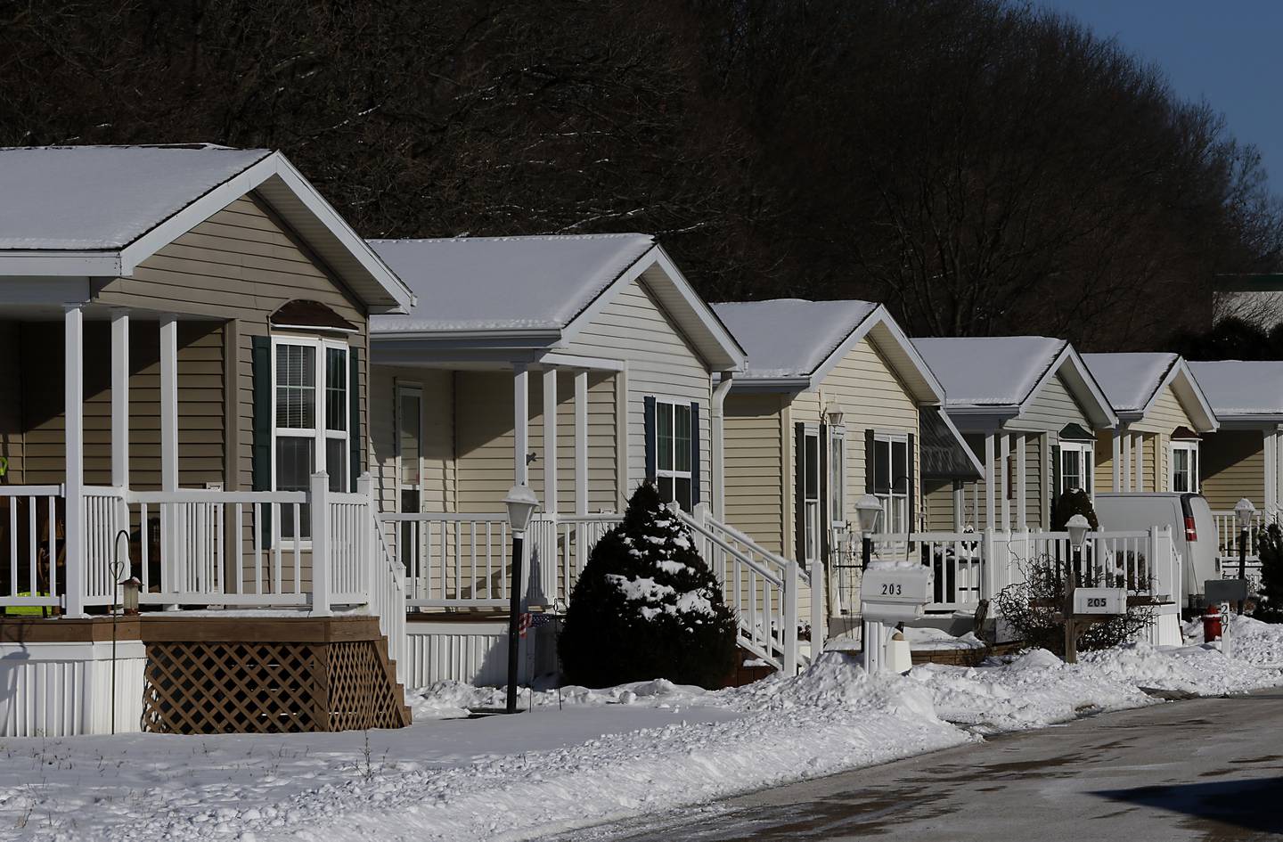 Homes line Forestview Drive in Oakbrook Estates on Wednesday, Jan. 26, 2022. Associated Bank recently announced that the bank completed a $36.84 million loan to a partnership of Marc Realty and Ravinia Communities for the acquisition and expansion of the age-restricted, 300-home manufactured community in Crystal Lake. Another 114 additional homes sites will be created in the community.
