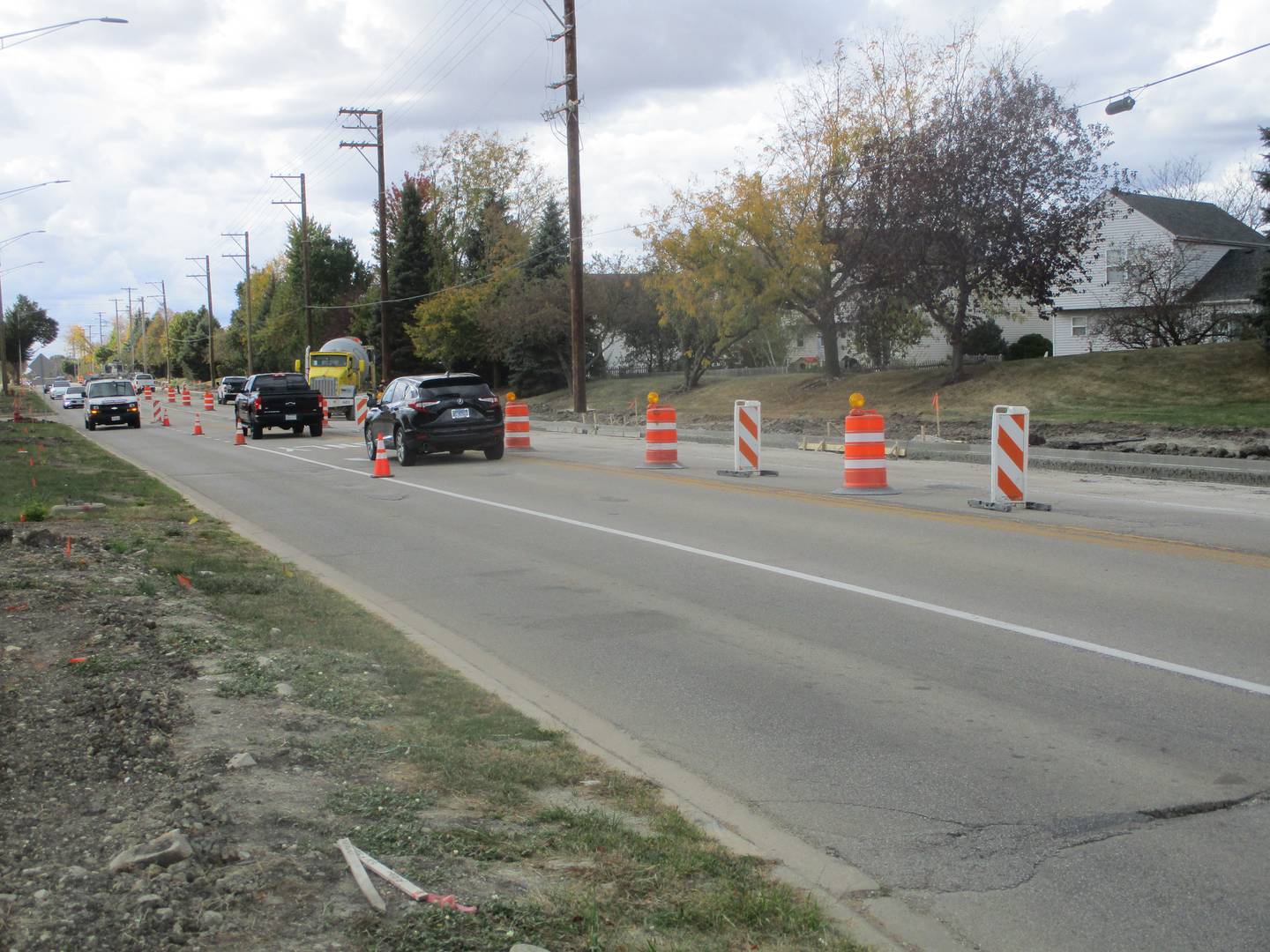 Theodore Street traffic moves through a construction zone between Wesmere Parkway and River Road on Monday, Oct. 14, 2024.
