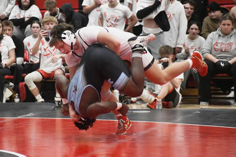 Bradley-Bourbonnais' Kayden Roach suplexes Kankakee's Charles Hill during  the All-City wrestling meet on Wednesday, Dec. 3, 2025.