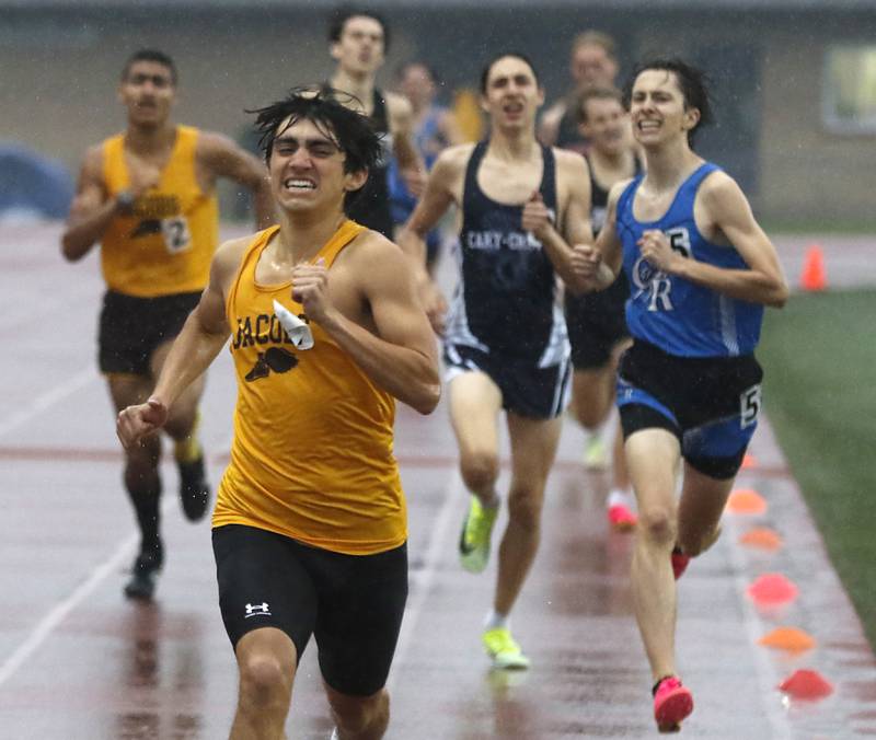 Jacobs’ Matthew Andreano breaks away from the field to win the 800 meter-run Friday, May 12, 2023, during the Fox Valley Conference Boys Track and Field Meet at Huntley High School.