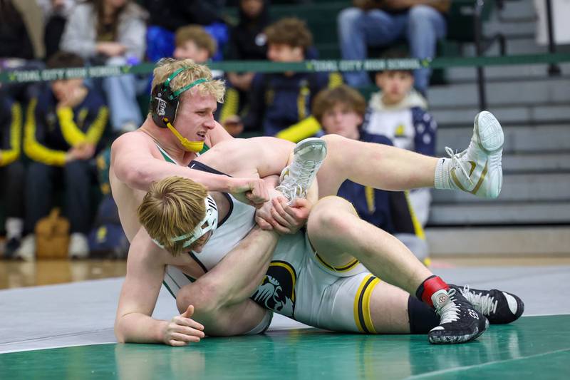 Coal City's Cade Poyner wrestles Herscher's Colton Carson in the 215-pound championship match during the IHSA Class 1A Coal City Sectional on Saturday, Feb. 14, 2026.