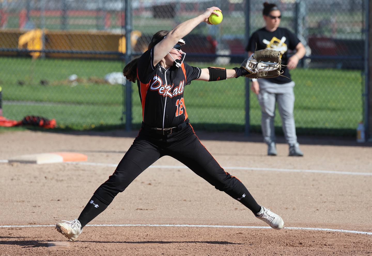 DeKalb's Addison McKiness delivers a pitch Wednesday, April 22, 2026, during their game against Metea Valley at DeKalb High School.