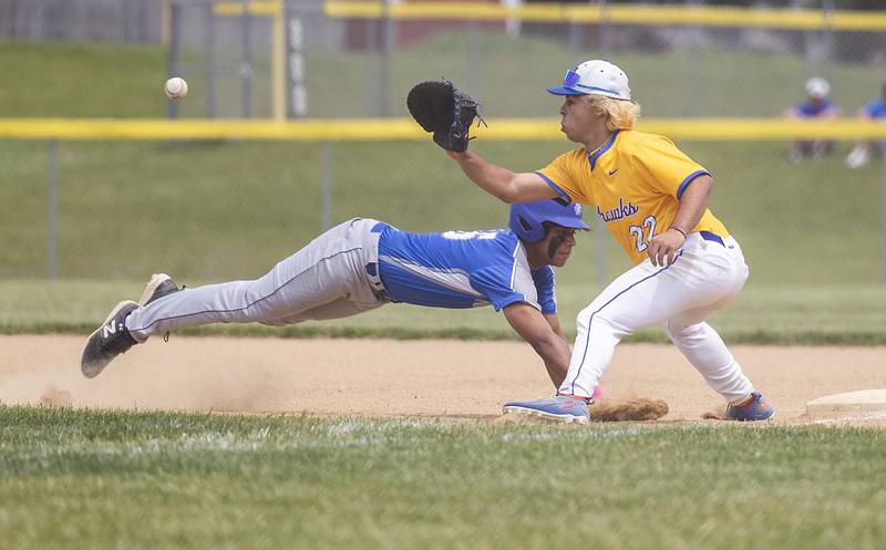Newman’s Tyson Williams is picked off by Johnsburg’s Dom Vallone Saturday, May 31, 2025, in the Class 2A Sectional final in Mendota.