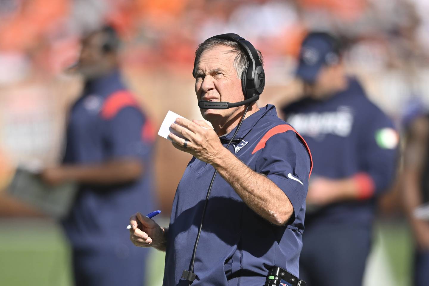 New England Patriots head coach Bill Belichick watches as his team plays against the Cleveland Browns during the second half of an NFL football game, Sunday, Oct. 16, 2022, in Cleveland.