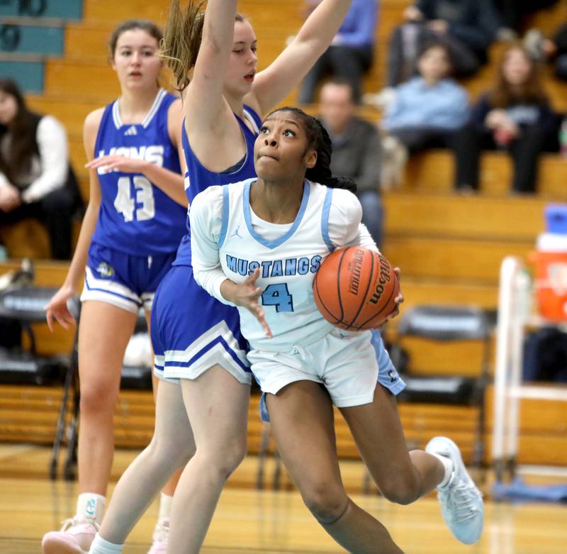Downers Grove South's Hayven Harden looks for an opening from under the basket during the West Suburban Conference championship game against Lyons Township on Thursday, Feb. 13, 2025 at Willowbrook High School.