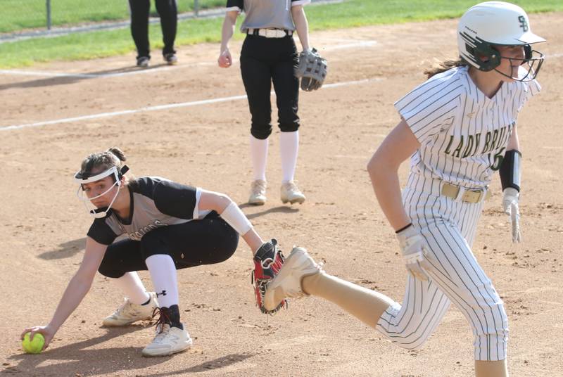 Woodland/Flanagan-Cornell pitcher Shae Simmons picks up a bunt and throws out St. Bede's Lili McClain at first on Monday, April 29, 2024 at St. Bede Academy.