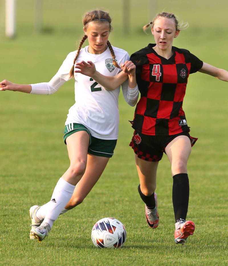 Indian Creek's Adriana Allen (right) and Alleman's Lindsey Britton race after the ball during their Class 1A sectional final game Friday, May 19, 2023, at Hinckley-Big Rock High School.