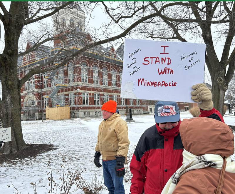 Indivisible of Ogle County held an "emergency protest" in downtown Oregon on Sunday, Jan. 25, 2026, criticizing the Trump administration's deployment of ICE officers to several states and the shooting death of Alex Pretti by ICE agents on Saturday in Minneapolis.