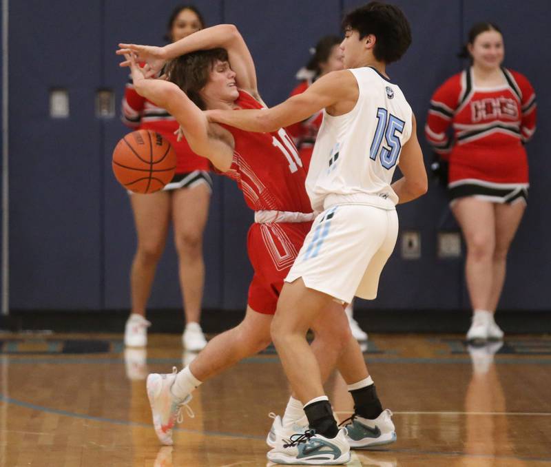 Hall's Greyson Bickett is fouled by Bureau Valley's Corban Chhim on Friday, Jan. 19, 2024 at Bureau Valley High School.