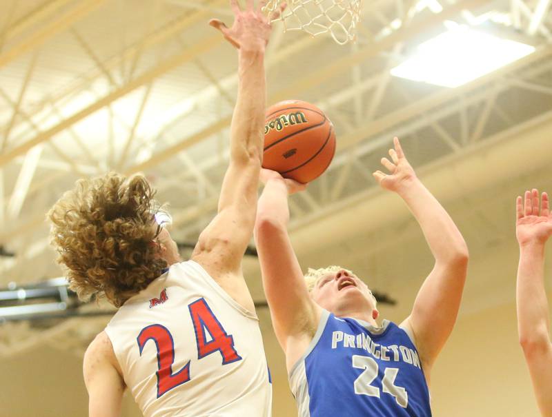 Princeton's Daniel Sousa eyes the hoop as Morrison's Brenden Martin defends during the Class 2A Regional final game on Friday, Feb. 23, 2024 at Erie-Prophetstown High School.