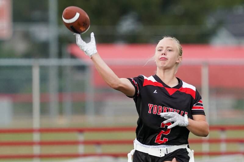 Yorkville's Brooke Ekwinski (2) throws a pass against Joliet Central during a flag football game at Yorkville High School on Monday, Sep 23, 2024.