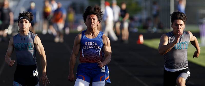 Woodstock North’s Chris Carreno, Genoa Kingston’s Sean Abracia-Wendel and Woodstock North’s Mark Duenas race to the finish Lin in the 100 meter dash during the IHSA Class 2A Belvidere Boys Track and Field Sectional Thursday, May 19, 2022, at Belvidere High School.