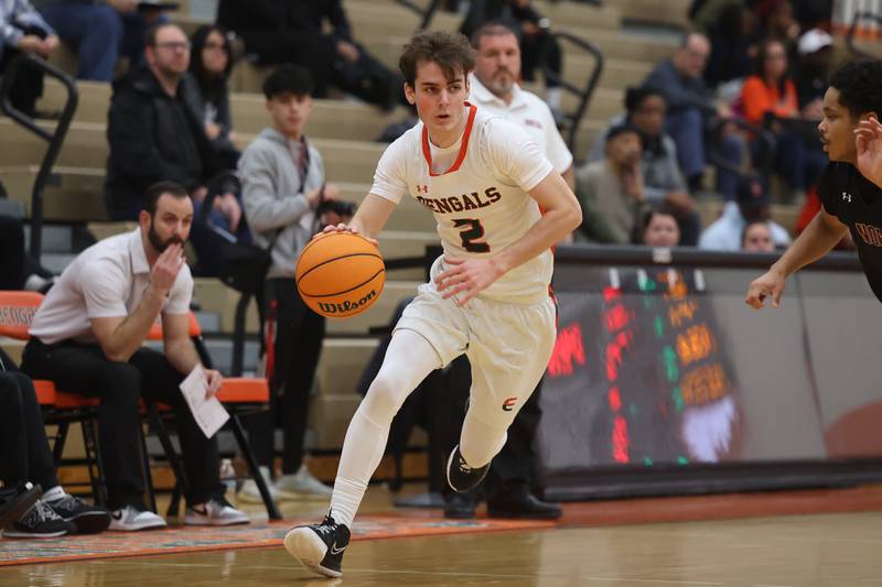 Plainfield East’s Joshua Stone makes a move to the baseline against Plainfield North on Tuesday, Jan 14, 2025.