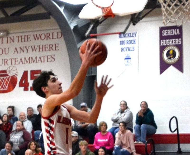 LaMoille's Tyler Billhorn goes in for a Layup in Friday's game with IMSA in LaMoille. Billhorn had a double-double of 27 points and 10 rebounds, but the Lions fell short 56-49 in Little Ten Conference action.