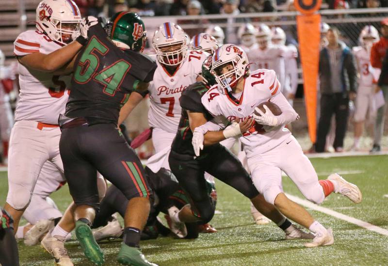 Ottawa's Archer Keicher runs the ball on a carry against L-P on Friday, Oct. 6, 2023 at Howard Fellows Stadium.