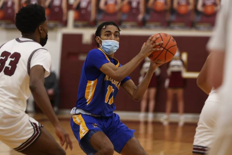 Joliet Central’s Timarion Sanders looks for a play against Lockport. Monday, Jan. 31, 2022 in Lockport.