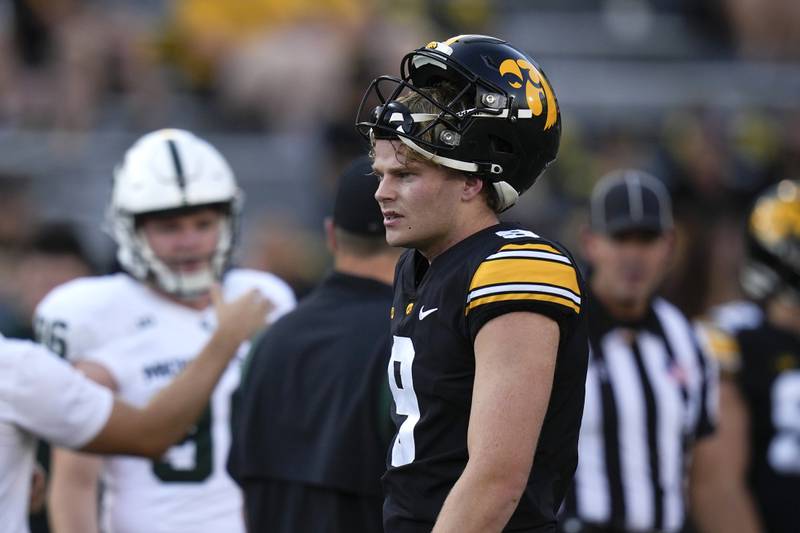 Iowa punter Tory Taylor (9) walks on the field before an NCAA college football game against Michigan State, Saturday, Sept. 30, 2023, in Iowa City, Iowa.