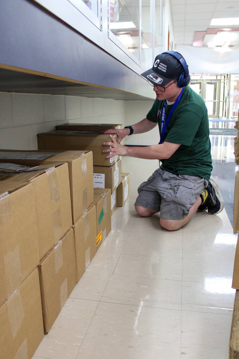 River View Elementary School custodian Wayne “Ike” Smith is one of more than 20 former Plainfield School District 202 students hired after completing an internship with Project SEARCH.
