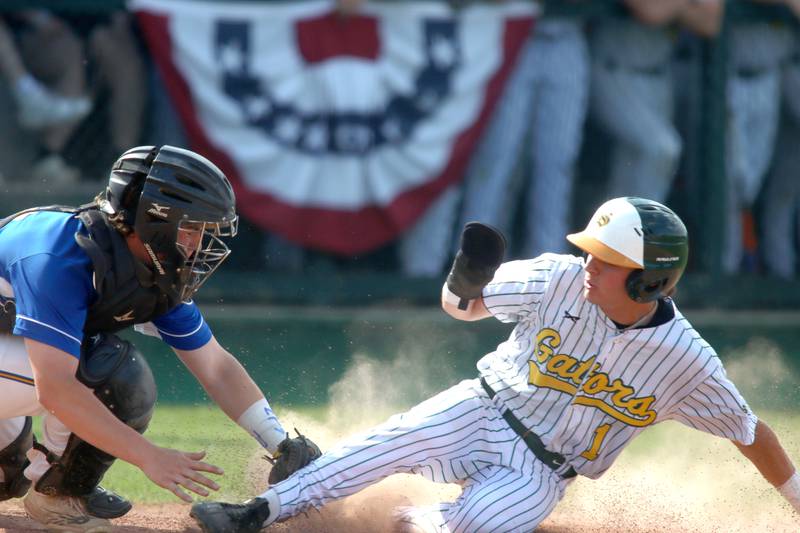 Crystal Lake South’s Dayton Murphy is tagged out by Lake Forest’s Charlie Quick at home plate in Class 3A baseball regional action at Crystal Lake Thursday.