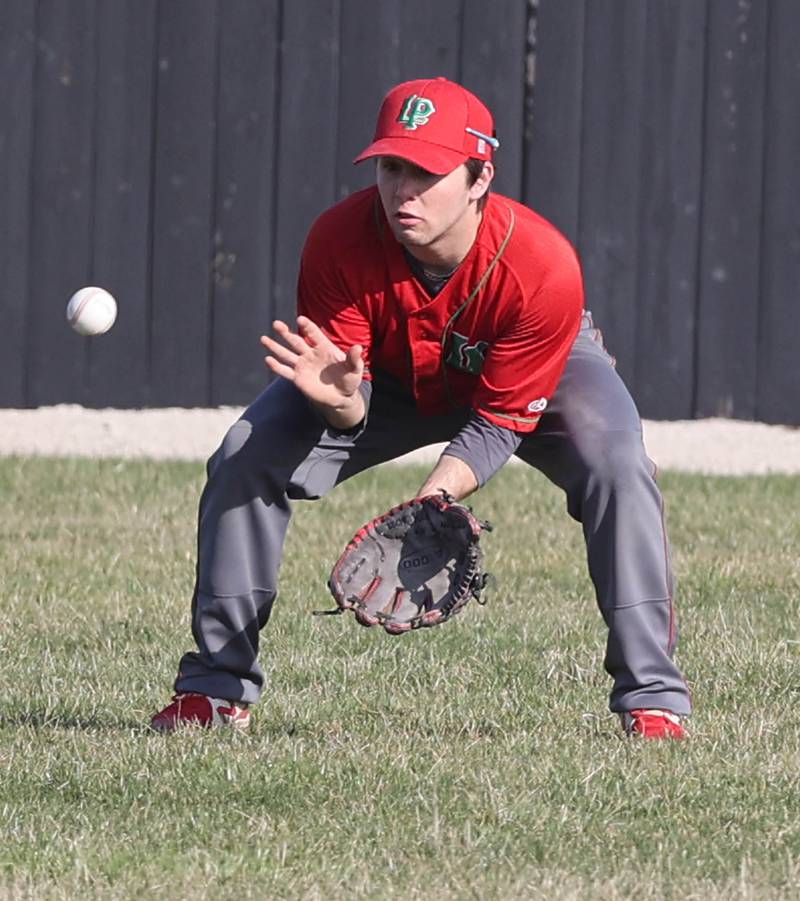 LaSalle-Peru centerfielder Brady Romagnoli plays the ball on a hop during their game against Sycamore Monday, April 11, 2022, at the Sycamore Community Sports Complex.