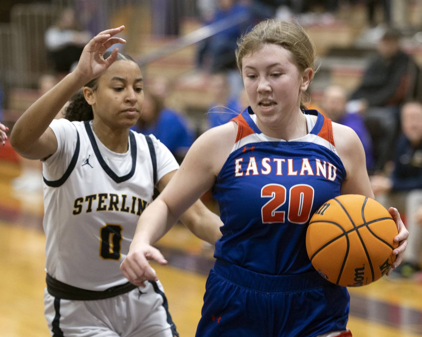 Eastland’s Tatum Grim brings the ball up court against Sterling’s Alivia Gibson Thursday, Dec. 26, 2024, during the Dixon Girls Holiday Basketball Tournament.