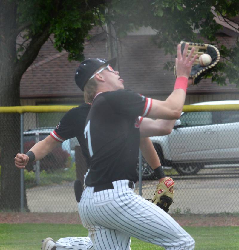 Fulton first baseman Jacob Huisenga catches a pop fly against River Ridge/Scales Mound at the 1A Lena-Winslow Sectional final on Saturday, May 31, 2025.