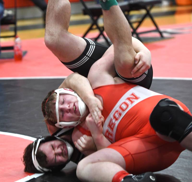 Oregon's Jacksyn Windham and Stillman Valley's Wyatt Burkett battle at 215 pounds at the Stillman Valley Holiday Tournament on Saturday, Dec. 20, 2025 at Stillman Valley High School.