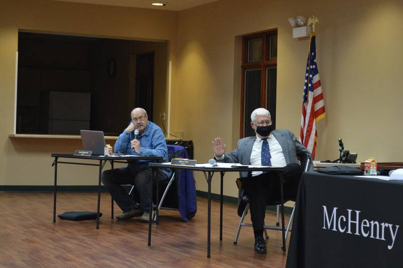 McHenry Township Trustee Steve Verr, right, and Trustee Stan Wojewski haggled Thursday night over how much to cut the township's property tax levy for its general town fund. Verr proposed cutting the levy by $1 million, or by about 80%, from what Township Supervisor Craig Adams proposed, but Wojewski and Trustee Mike Rakestraw got Verr and Trustee Bob Anderson to agree to a $750,000 levy, about a 40% cut from Adams' proposal.