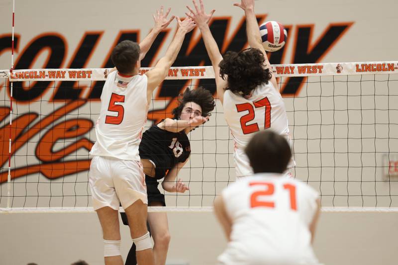 Lincoln-Way West’s Ben Flores hits a shot past the defense against Plainfield East on Wednesday, March 22nd. 2023 in New Lenox.