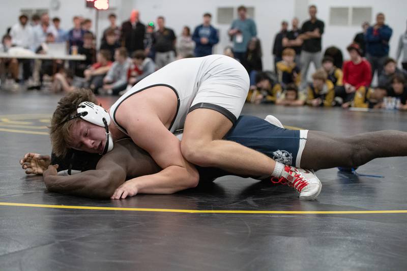 Bradley-Bourbonnais Kayden Roach, top, and Chicago Hope's Arkail Griffin wrestle in the 175-pound championship match during the Reed-Custer Comet Classic Wrestling Invite on Saturday, Jan 17.